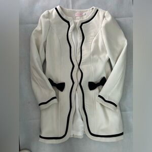 Black and white dress coat fully lined with two snap front closures